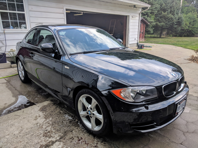 Illustration for article titled Finally put plates on the 128i and gave it a proper wash